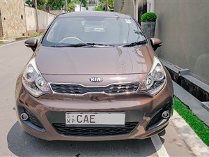 kia-rio-hatchback-brown-beige-interior-2014-cars-for-sale-in-colombo